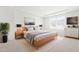 A bright main bedroom with a large window and modern decor at 3101 Brellon Ln, Durham, NC 27703