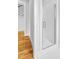 Bathroom with a glass door shower, white subway tile, and neutral finishes at 320 Chickasaw Plum Dr, Holly Springs, NC 27540