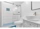 Modern bathroom featuring a beautifully tiled shower, stylish vanity, and contemporary fixtures at 320 Chickasaw Plum Dr, Holly Springs, NC 27540