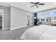 Comfortable main bedroom with a large window that provides ample natural light at 320 Chickasaw Plum Dr, Holly Springs, NC 27540