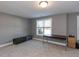 Bedroom with carpet and gray walls, large windows and some furniture at 333 Bald Head Island Dr, Garner, NC 27529