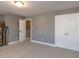 Bedroom with carpet and gray walls, with a closet and white trim at 333 Bald Head Island Dr, Garner, NC 27529