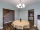 Cozy dining area with stylish flooring, leading to kitchen, perfect for Gathering meals and gatherings at 333 Bald Head Island Dr, Garner, NC 27529