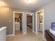 Upstairs hallway featuring a laundry room, a bedroom and a bathroom at 333 Bald Head Island Dr, Garner, NC 27529