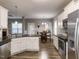 Modern kitchen featuring granite countertops, stainless steel appliances, and open layout at 333 Bald Head Island Dr, Garner, NC 27529