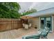 Back deck features outdoor seating, perfect for enjoying the backyard with privacy fence at 403 Rolling Rd, Haw River, NC 27258
