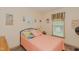 Cheerful bedroom with decorative pillows and coastal decor at 403 Rolling Rd, Haw River, NC 27258
