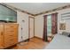 Functional bedroom with wood floors and neutral walls at 403 Rolling Rd, Haw River, NC 27258