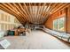 Spacious unfinished attic with exposed beams, insulation, and ductwork, ready for customization at 404 S Camellia St, Chapel Hill, NC 27516