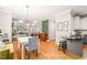 Open-concept living space with seamless flow between kitchen, dining, and living areas at 404 S Camellia St, Chapel Hill, NC 27516
