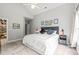 Bright bedroom with vaulted ceiling, neutral carpet, large window and closet at 404 S Camellia St, Chapel Hill, NC 27516