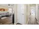 Welcoming living room with hardwood floors, a cozy couch, and stylish decor at 4508 Cobble Creek Ln, Raleigh, NC 27616