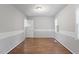 Comfortable bedroom with vinyl floors, soft lighting, and a serene atmosphere at 4812 Kaplan Dr, Raleigh, NC 27606