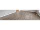 Bright living room featuring modern vinyl floors and fresh paint at 4812 Kaplan Dr, Raleigh, NC 27606