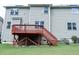 Exterior view of the raised wooden deck overlooking the yard. Attached to the home's upper level at 5016 Trembath Ln, Cary, NC 27519