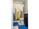 Cozy bathroom features a shower/tub combo with patterned curtain, and a matching blue rug at 5016 Trembath Ln, Cary, NC 27519