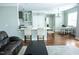 Contemporary kitchen featuring a breakfast bar, bright white cabinets and modern finishes at 5016 Trembath Ln, Cary, NC 27519