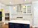 Well-appointed kitchen with stainless steel appliances, custom cabinetry, and sleek countertops at 5016 Trembath Ln, Cary, NC 27519