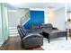 Spacious living room with hardwood floors, comfortable seating, and stylish accents at 5016 Trembath Ln, Cary, NC 27519