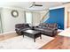 Stylish living room with hardwood floors, modern furniture, and plenty of seating at 5016 Trembath Ln, Cary, NC 27519