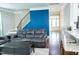 Open-concept living space with modern decor, seamless flow, and abundant natural light at 5016 Trembath Ln, Cary, NC 27519