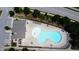 Aerial view of a community pool featuring lounge chairs and manicured landscaping at 5016 Trembath Ln, Cary, NC 27519