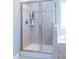 Bright bathroom with tiled shower with glass doors and tiled walls with decorative accents at 5016 Trembath Ln, Cary, NC 27519