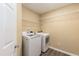 Laundry room featuring modern washer and dryer at 5609 Barham Ct, Raleigh, NC 27613