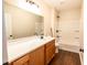 Updated bathroom with vanity and shower-tub combo at 6 1St St, Franklinton, NC 27525