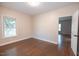 Comfortable bedroom with hardwood floors and natural light at 6 1St St, Franklinton, NC 27525