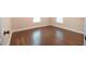 A bright and spacious room with hardwood floors and two windows at 6 1St St, Franklinton, NC 27525