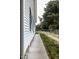 Exterior side view of home with sidewalk, fence, and lawn at 6 1St St, Franklinton, NC 27525