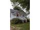 Close up of the inviting front porch with American flag at 6 1St St, Franklinton, NC 27525