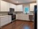 Updated kitchen features stainless appliances and lots of light at 6 1St St, Franklinton, NC 27525