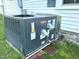 Close-up of Goodman air conditioning unit, installed and ready to keep your home cool and comfortable at 6 First St, Franklinton, NC 27525
