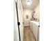 A functional laundry room with washer, dryer and vinyl floors at 6 First St, Franklinton, NC 27525