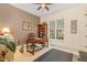 Bright home office with a large window, desk, and cozy decor at 605 Bear Tree Crk, Chapel Hill, NC 27517
