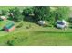 Spacious property with multiple outbuildings and lush green lawns at 623 Chambers Rd, Rougemont, NC 27572