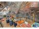 A cluttered attic with insulation and storage bins at 6648 Mafolie Ct, Raleigh, NC 27613
