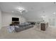 Finished basement features a wet bar, pool table, large sectional couch, and entertainment area at 6648 Mafolie Ct, Raleigh, NC 27613