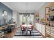 Modern dining area featuring a table, chairs, and stylish decor, perfect for gatherings and everyday meals at 6648 Mafolie Ct, Raleigh, NC 27613