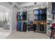 Spacious walk-in closet with custom shelving and hanging rods for organized storage at 6648 Mafolie Ct, Raleigh, NC 27613