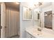 Bathroom with neutral paint, white vanity and a shower/tub combo at 6685 English Ivy Ln, Raleigh, NC 27615