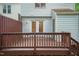 Wood deck of home, showing access to backyard and privacy fence at 6685 English Ivy Ln, Raleigh, NC 27615
