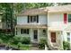 Charming townhome with a cozy front porch and beautiful landscaping at 6685 English Ivy Ln, Raleigh, NC 27615