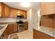 Well-equipped kitchen featuring stainless steel appliances and granite countertops at 6685 English Ivy Ln, Raleigh, NC 27615