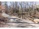 Well-maintained path for walking, jogging, and bike riding located along a creek at 6685 English Ivy Ln, Raleigh, NC 27615