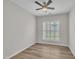 Bright and airy bedroom with a modern ceiling fan and a large window that floods the room with natural light at 804 Harsworth Dr, Cary, NC 27519