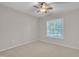 Bright and spacious bedroom with ample natural light through a large window with privacy shutters at 804 Harsworth Dr, Cary, NC 27519