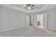 Bedroom featuring doorways to the walk-in closet and bathroom with double sink vanity at 804 Harsworth Dr, Cary, NC 27519